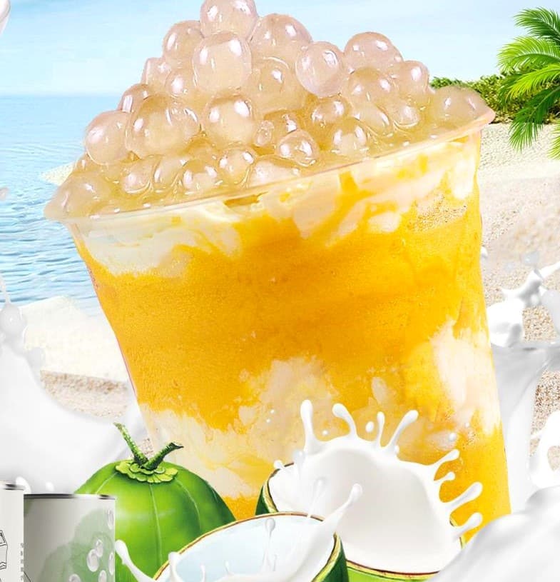 Mango popping boba in a finished drink